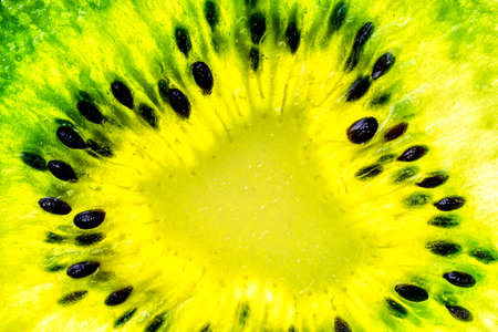 Close-up detail of the inside of a kiwi, where the interior is perfectly observed.の写真素材