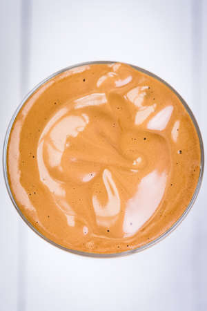Iced Dalgona Coffee, a trendy fluffy creamy whipped coffeeの写真素材
