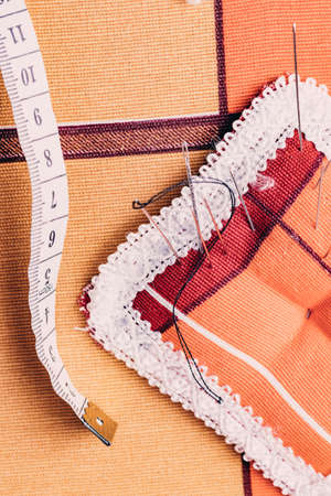 Tools for tailor, instruments for practicing sewing on a white background.