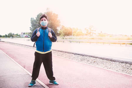 Child with a mask on his face to protect himself from the coronavirus.