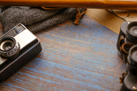 Scan background. Wooden background with camera, binoculars, cane...の写真素材