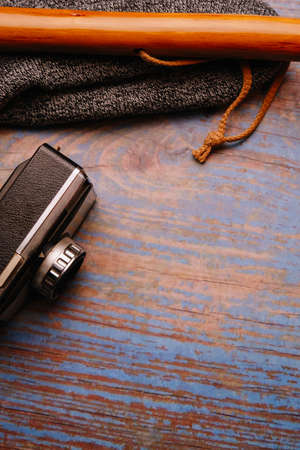 Scan background. Wooden background with camera, binoculars, cane...の写真素材