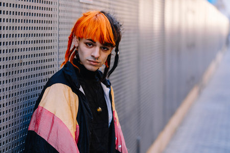 Portrait of young guy with painted hair.の写真素材