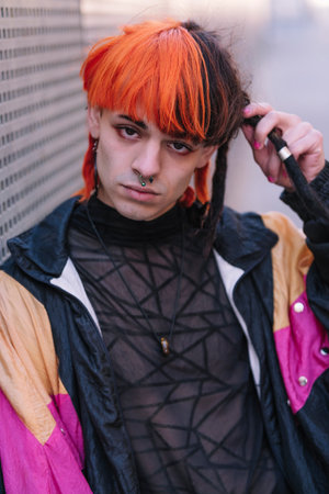 Close-up of young guy with painted hair.の写真素材
