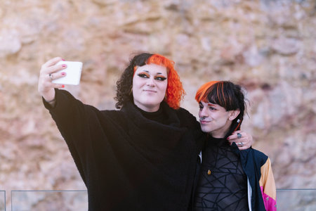 Couple of a boy with a transgender girl with an urban look.の写真素材