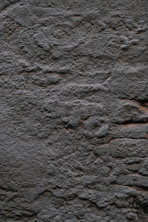 Background wall worn by time and missing pieces.の写真素材