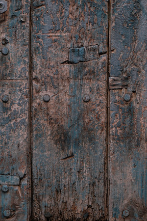 Background of wooden boards with a blue paint worn by time.の写真素材