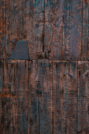 Background of wooden boards with a blue paint worn by time.の写真素材