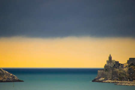 castle by the sea against a cloudy skyのeditorial素材