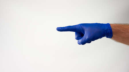 Body language, the doctor points a finger.On a white backgroundの写真素材