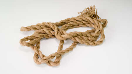 Rope on a white background.Thick Strong cord.Cord for craft