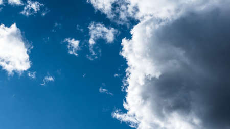 Fluffy white clouds close-up, storm clouds in the sky.の写真素材