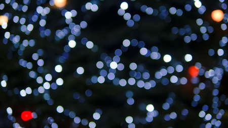 Bokeh lights, beautiful colored circles, blurred background of the night city.