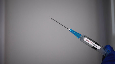 Medical flu shot, vaccine. Medicine in a syringe for a viral disease. 14.01.2020 Ukraineのeditorial素材