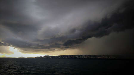 Thunderclouds above sea level, incredible rain clouds, abnormal weather, climate changing, gloomy...