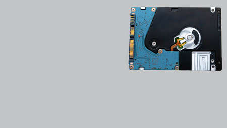 HDD on a gray background with a copy of the space. Storage concept Open hard drive. Drive isolated...