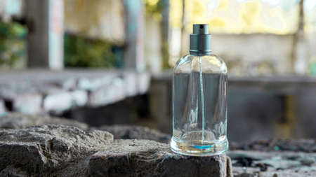 Perfume for men on the background of old destroyed walls.の写真素材