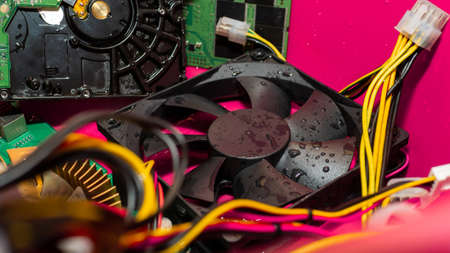 Computer components, computer cooler in drops of water, flea market of microcircuits. Electronic...