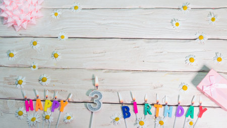A beautiful card for a birthday in pastel colors in pink shades with a number  3. The decorations of...