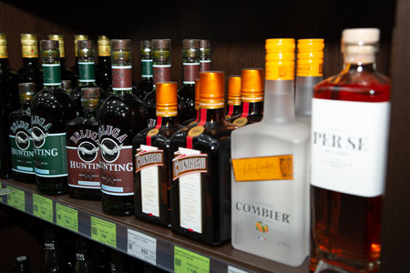 Shelves with different sorts of alcoholic beverages.のeditorial素材
