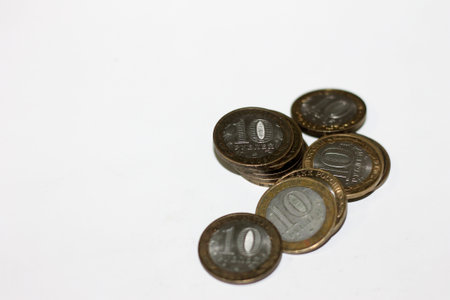Coins of Thailand on a white background, closeup of photoの写真素材