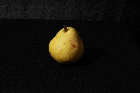 pear on a black background, with space for text or imageの写真素材