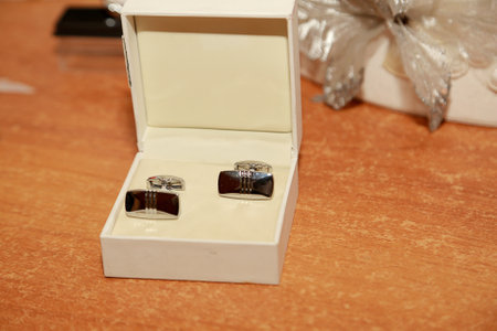 wedding rings in a white box, closeup of photo