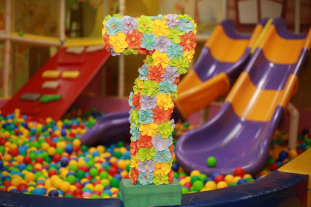 Colorful plastic toys in a children's playground, close-up