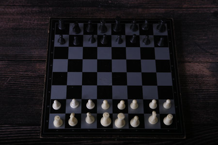 Chess board with chess pieces on it. black and white backgroundの写真素材