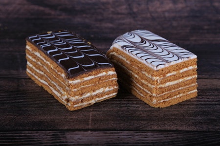 Cake with chocolate on a wooden background. selective focus.
