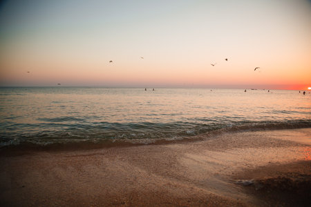 Beautiful sunset on the beach of the Mediterranean Sea. Toned.