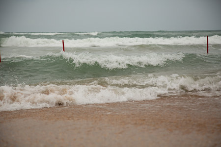 Beach of the Baltic Sea with waves crashing against the shore.