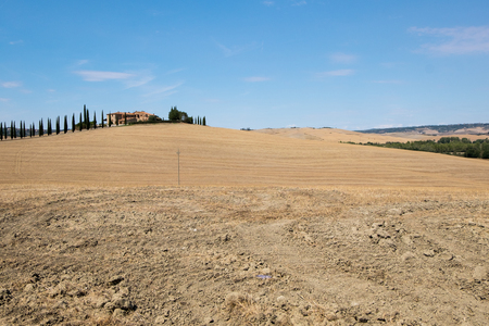 Plowed field ready to be cultivated in Val d'Orcia, Tuscanyの写真素材