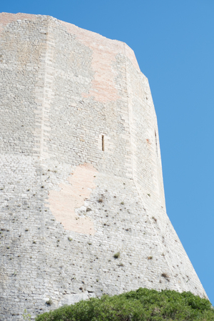 ruin old tower of fortress in tuscanyの写真素材