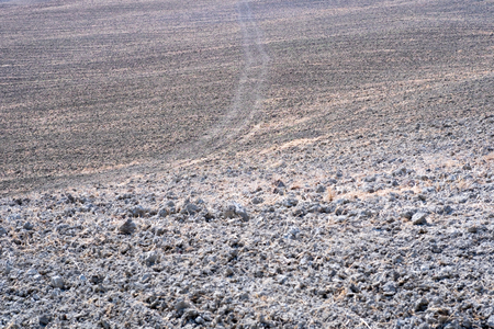 Plowed field ready to be cultivated in Val d'Orcia, Tuscanyの写真素材