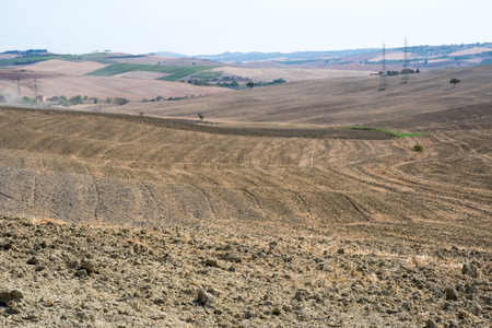 Plowed field ready to be cultivated in Val d'Orcia, Tuscanyの写真素材