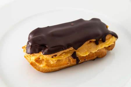 piece of cake with chocolate sugar, cream and cream