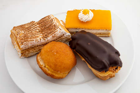 piece of cake with chocolate sugar, cream and cream