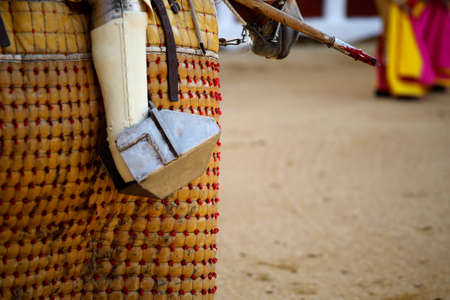 Foot of a picador in a bullring
