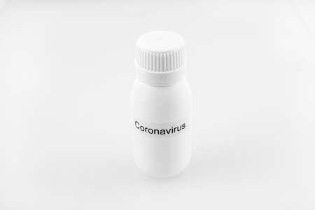 white canister of coronavirus on a white backgroundの写真素材
