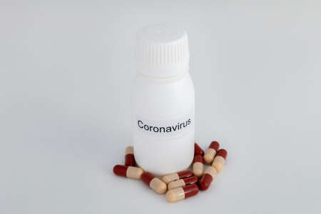 white canister of coronavirus on a white background