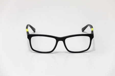 glasses with black frame and of paste on a white background