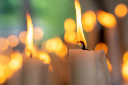 lit candles with selective focus and bokeh effect