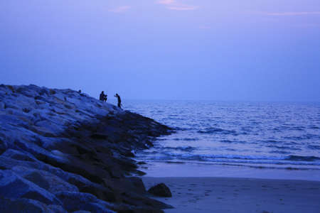 Fishing after sunset at Sangjun beach Rayong Thailand
