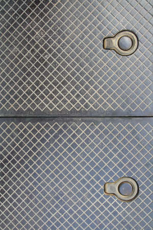 hook on the manholeの写真素材