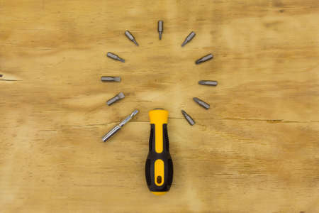 top view of screw driver on wood backgroundの写真素材