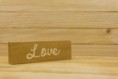 Love word in wooden backgroundの写真素材