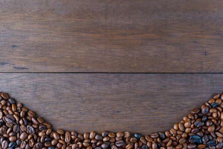 coffee bean with simple shape on wooden background