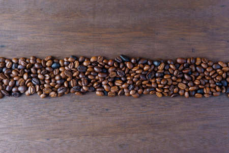 coffee bean with simple shape on wooden backgroundの写真素材