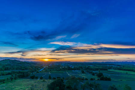 Mountain field during sunsetの写真素材